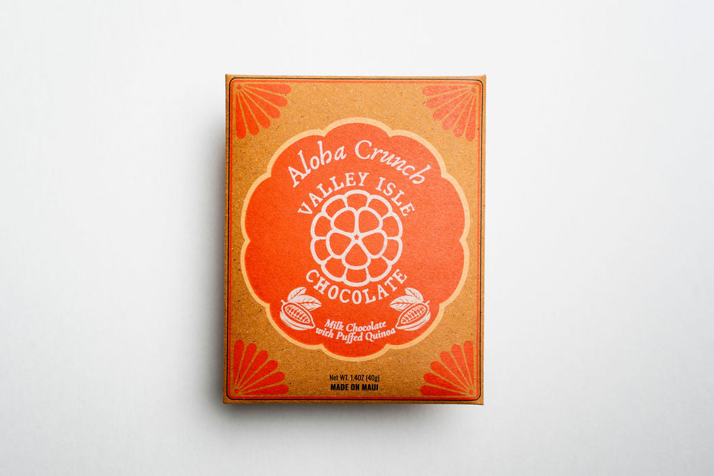 Valley Isle Chocolate box Aloha Crunch with orange and red design on a white background