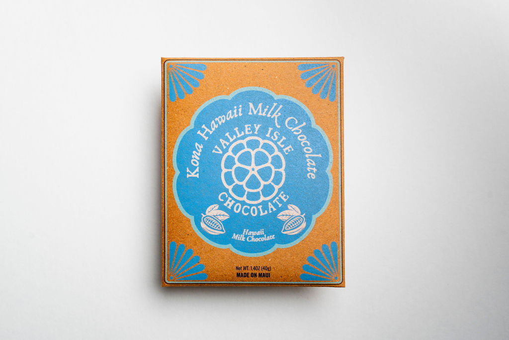 Kona Hawaii Milk Chocolate box with blue and orange design on a light gray background