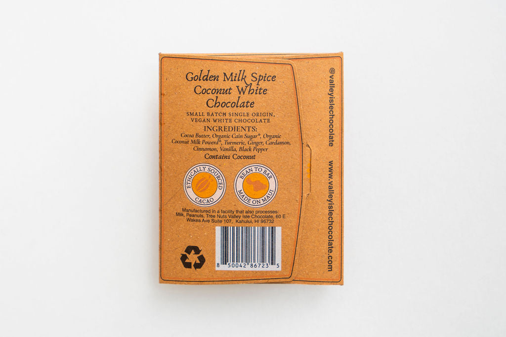 Brown packaging of Golden Milk Spice Coconut White Chocolate on a white background