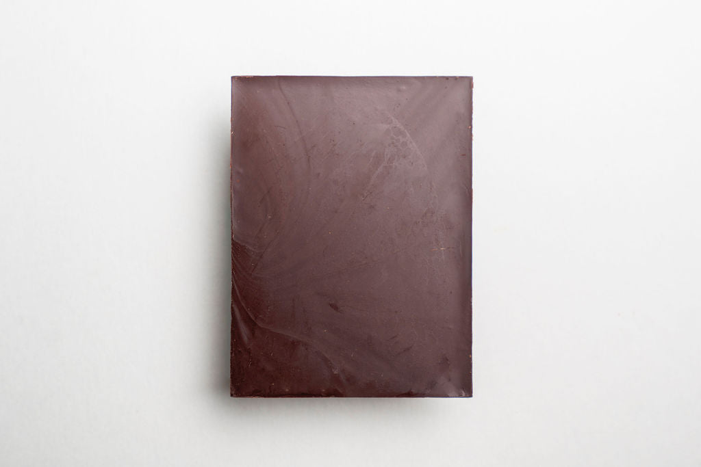 Brown chocolate bar on a white background